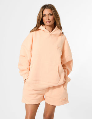 Kaiia Embossed Logo Oversized Hoodie Orange Sherbet
