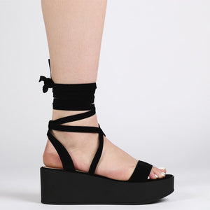 Diya Flatform Sandals in Black Faux Suede