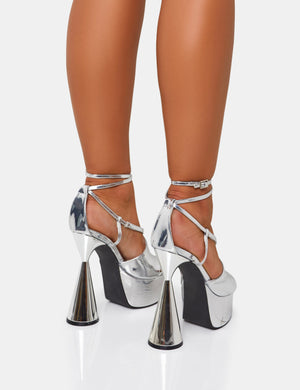 Tina Iridescent Silver Mirror Asymmetric Cut Out Strappy Ankle Platform Flared Block Heel